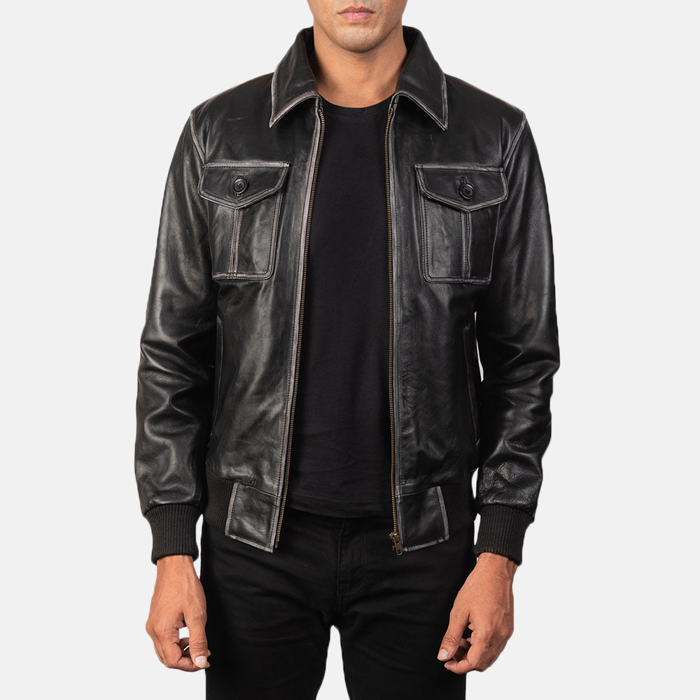 
Aaron Distressed Black Leather Bomber Jacket in Black Cowhide Leather - عرض أمامي وقَصّة مفصلة أنيقة | شراء أونلاين عبر المتجر الرسمي