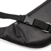 
Solid Antique Brass Hardware & Heavy-Duty Dual Zipper Detail on Vernio حقيبة خصر جلدية