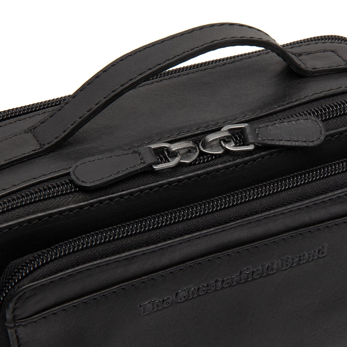 
Solid Antique Brass Hardware & Heavy-Duty Dual Zipper Detail on Rovon حقيبة كروس جلدية