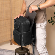 Solid Antique Brass Hardware &amp; Heavy-Duty Dual Zipper Detail on Calden Full-Grain Leather Laptop Backpack نسائي