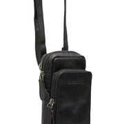 
Tailored Rib Cuffs & Hem Craftsmanship Construction Detail on Valdes جلد طبيعي فل جرين Phone Bag