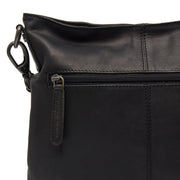 
Solid Antique Brass Hardware & Heavy-Duty Dual Zipper Detail on Jen حقيبة كتف جلدية