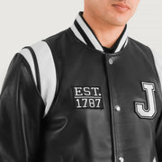 
تفاصيل مقربة of Varsity & Snap Button Hardware on Liberte New Jersey أسود Leather Varsity جاكيت جلد رجالي
