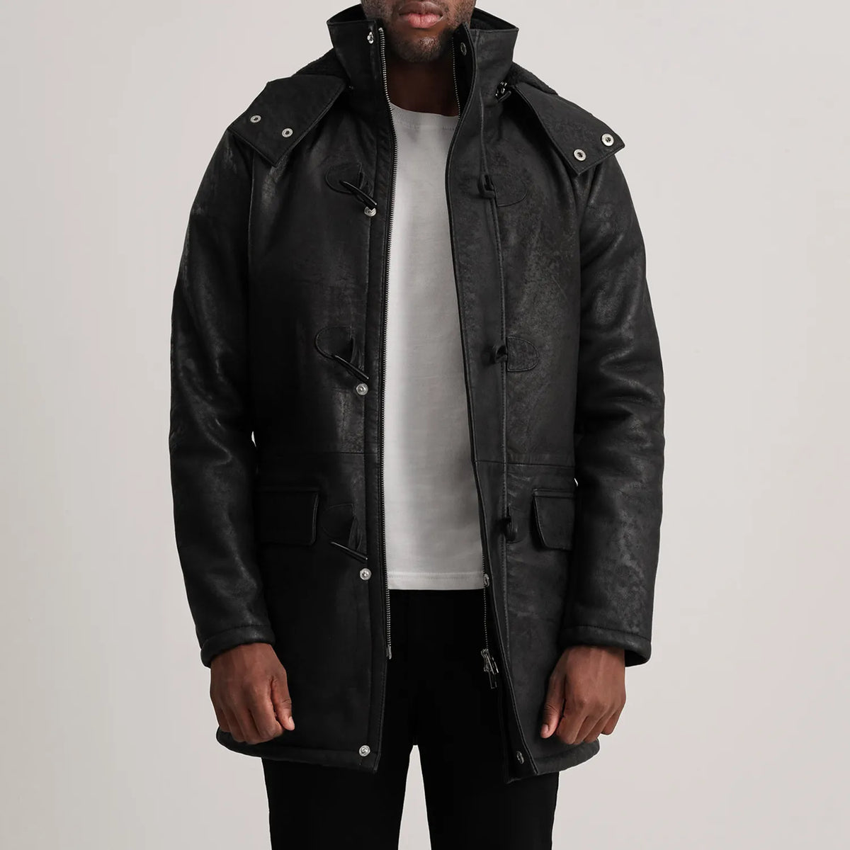 
Nolan Black Snuffed Leather Duffle Coat in Distressed Black Sheepskin Snuffed - عرض أمامي وقَصّة مفصلة أنيقة | شراء أونلاين عبر المتجر الرسمي