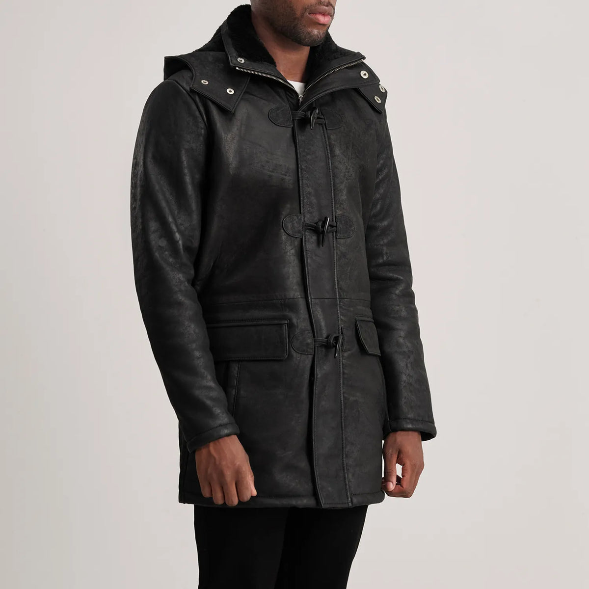 
Distressed Black Sheepskin Snuffed Hooded Jacket - عرض خلفي يوضح تفصيل الأكتاف المتقن والحاشية النظيفة