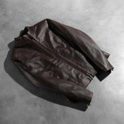 
تفاصيل حرفية لصنع الحاشية في Rumella Maroon Leather Biker Jacket
