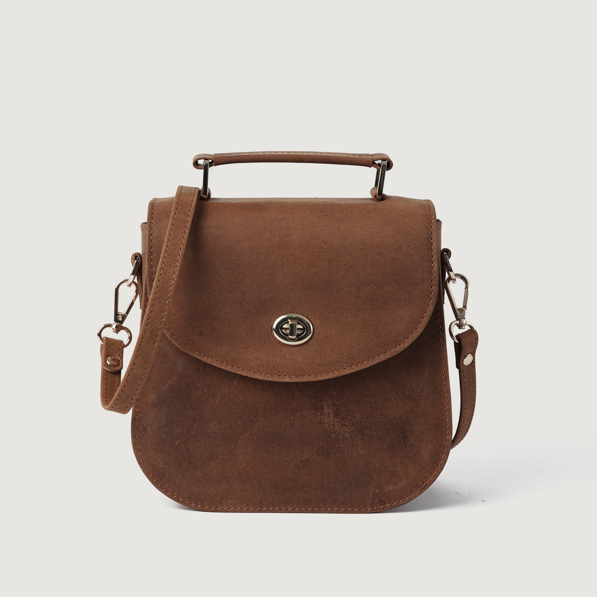 
The Sandra Vintage بيج تان Leather Saddle Bag For Women in Tan Full Grain Naturally Milled Cowhide Leather. - Full Exterior عرض أمامي وقَصّة مفصلة أنيقة | شراء أونلاين عبر المتجر الرسمي